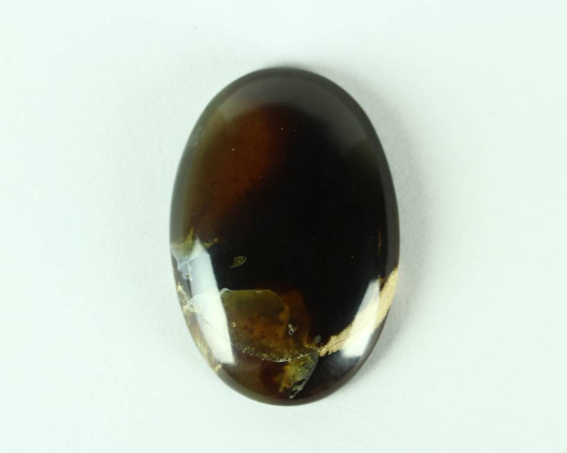 Bursztyn z Indonezji 43,7x29,6 kaboszon